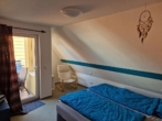 Schlafzimmer_2 - Zen­tra­le Dach­ge­schoss­woh­nung mit Balkon