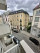 Ausblick_Balkon - 1‑Zim­mer-Woh­nung im Her­zen von Mün­chen mit Teil­mö­belie­rung und Einbauküche