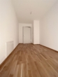 Flur Garderobe - Moder­ne, groß­zü­gi­ge 2- Zim­mer Woh­nung in Aubing mit Ein­bau­kü­che und Balkon