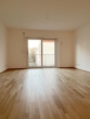 Wohnzimmer 2 - Moder­ne, groß­zü­gi­ge 2- Zim­mer Woh­nung in Aubing mit Ein­bau­kü­che und Balkon
