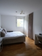 Schlafzimmer_I - Neu­wer­ti­ge 3‑Zimmerwohnung mit gemüt­li­cher Log­gia in Riem