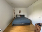 Schlafzimmer - Moder­ne 4‑Zimmer Woh­nung mit fan­tas­ti­schem Ausblick