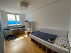 zweites Kinderzimmer - Moder­ne 4‑Zimmer Woh­nung mit fan­tas­ti­schem Ausblick