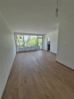 Wohnbereich_IV - Groß­zü­gi­ge 1‑Zimmer Woh­nung mit Bal­kon — Erst­be­zug nach Sanierung