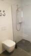 Dusche - Hel­le Woh­nung in guter Lage