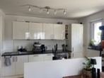 Küche - Moder­ne 3‑Zimmer Woh­nung mit Einbauküche