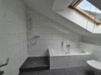 Bad_IV - Moder­ne 2‑Zim­mer-Woh­nung in guter Lage mit exklu­si­vem Grundriss